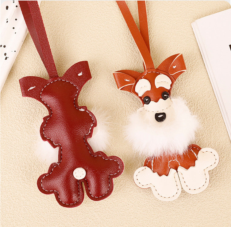 Plush Christmas dog charm designed for handbags and backpacks