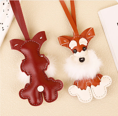 Plush Christmas dog charm designed for handbags and backpacks