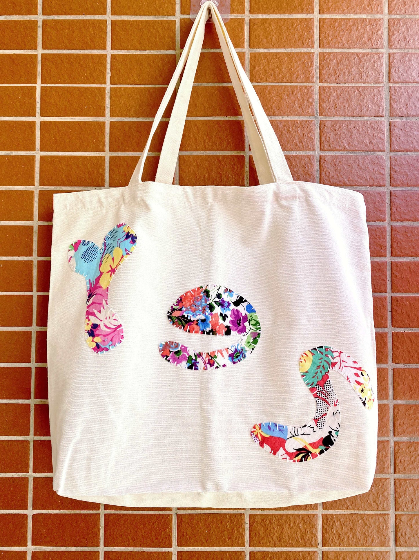 Tote bag with graphic lettering rather than printed slogans