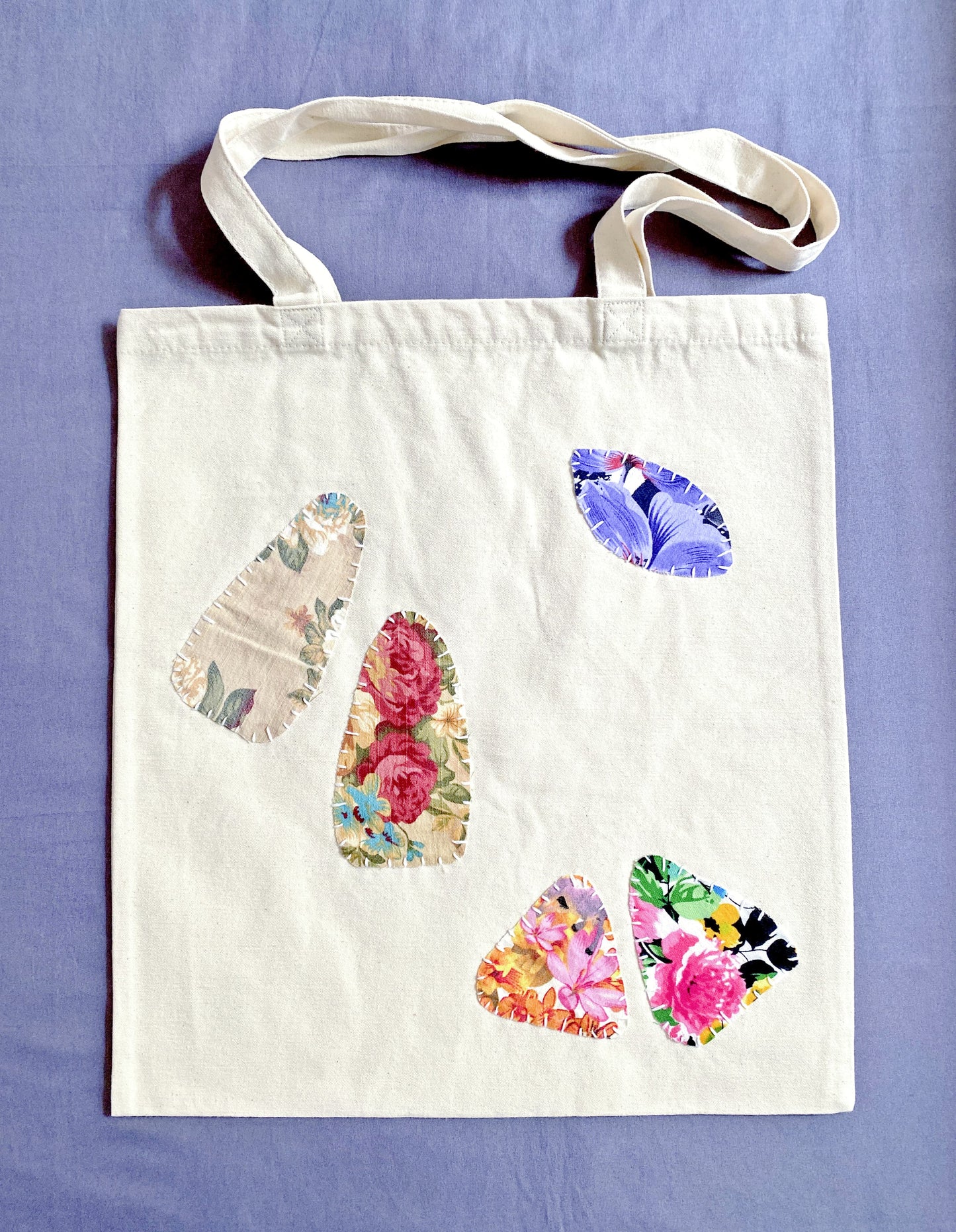 Hand-stitched patchwork canvas tote for carrying books and groceries