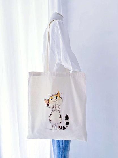 Swapped plastic for this hand-printed kitty tote to make grocery runs feel joyful.