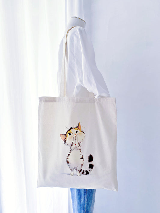 Swapped plastic for this hand-printed kitty tote to make grocery runs feel joyful.