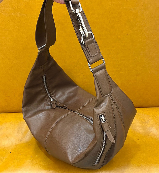 Crescent sling bag for weekend travel essentials