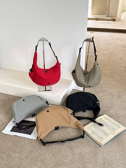 Small half moon sling bag for travel sightseeing