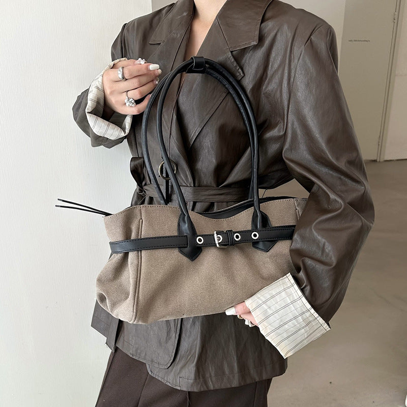 A closer look at the bag's handles and construction