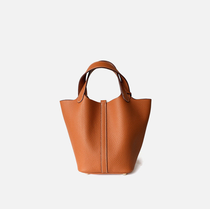 Women's Soft Leather Handbag with Unique Clasp and Shoulder Strap