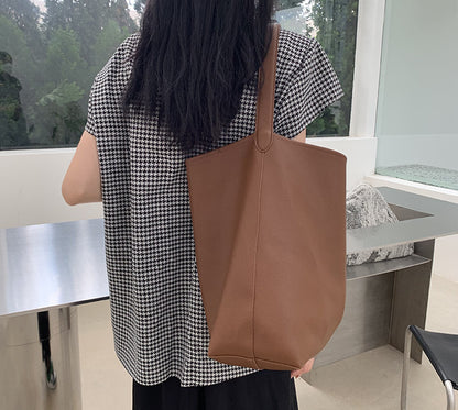 Casual leather handbag with removable inner pouch