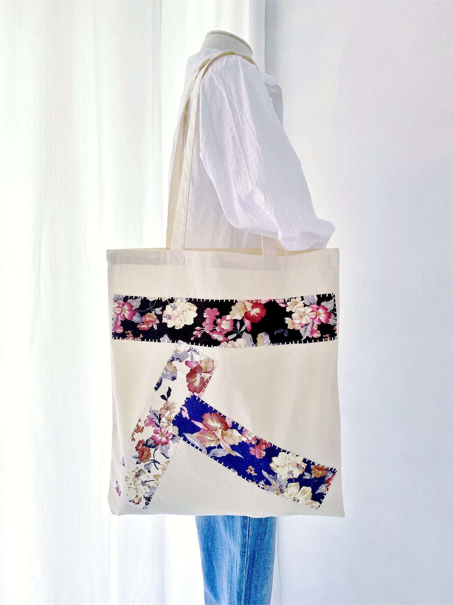 Soft and durable tote bag, perfect for carrying a laptop without added bulk.