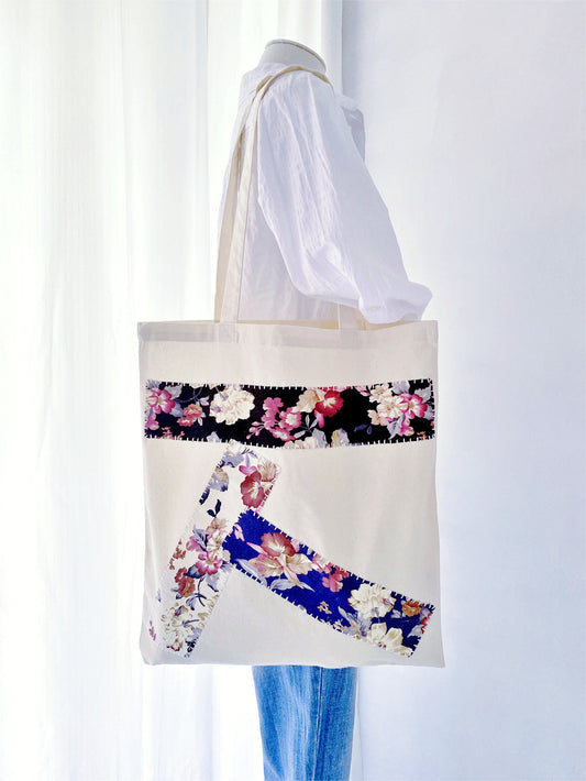 Travelers prefer this foldable, ultra-weightless cotton shopper to organize carry-on items without adding bulk or weight.