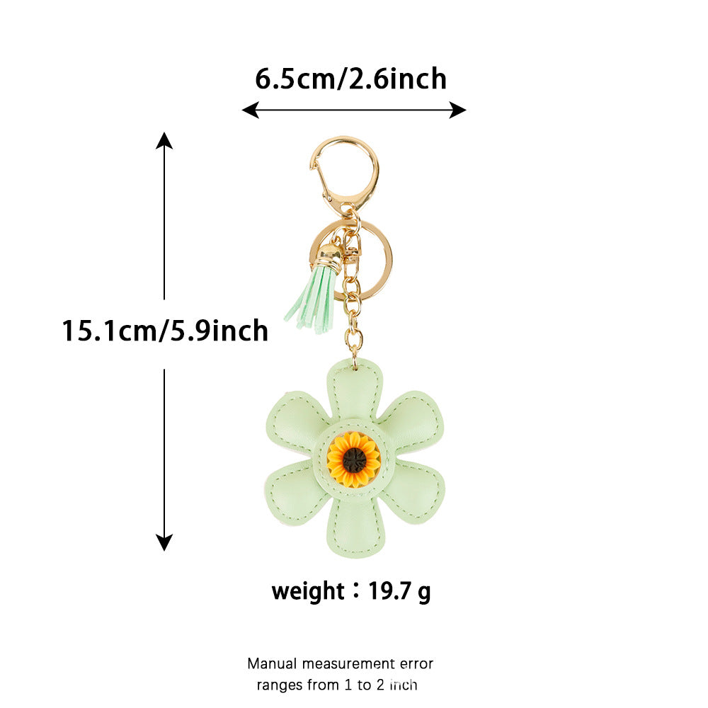 Sunflower tassel pendant attached to a casual tote