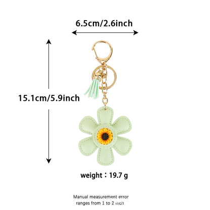 Sunflower tassel pendant attached to a casual tote