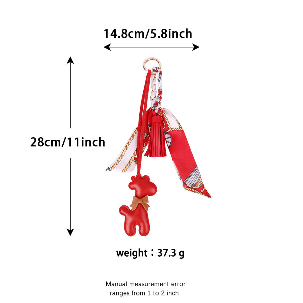 Cute giraffe detail used as a personal bag accessory
