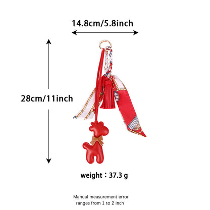 Cute giraffe detail used as a personal bag accessory