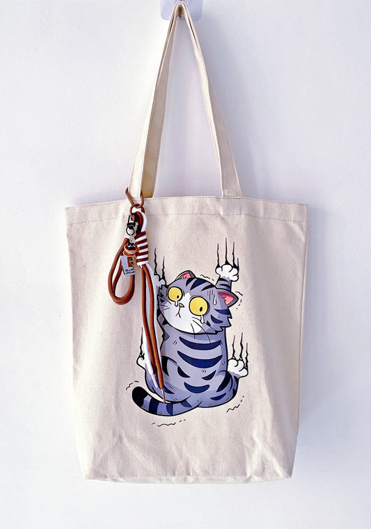 Foldable eco-friendly tote with unique artisan cat print for daily errands