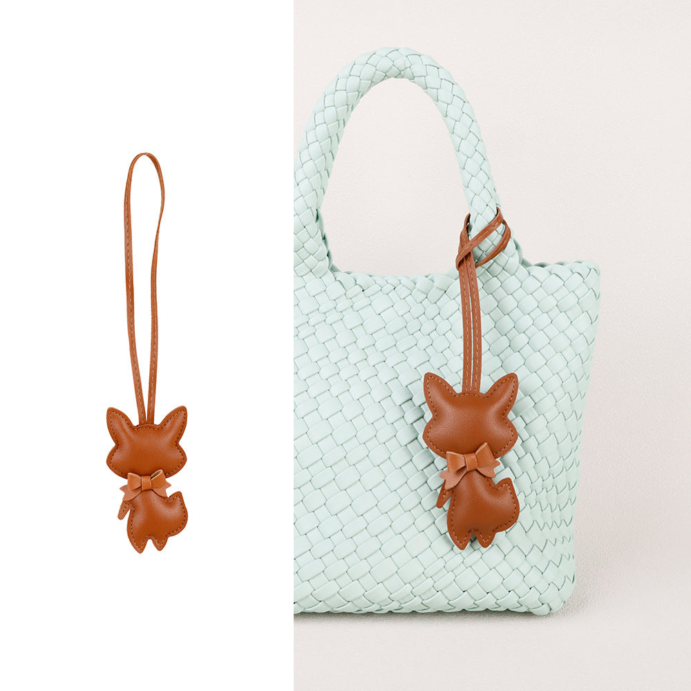 Colorful scarf detail on a fox-shaped handmade accessory