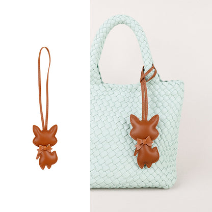 Colorful scarf detail on a fox-shaped handmade accessory
