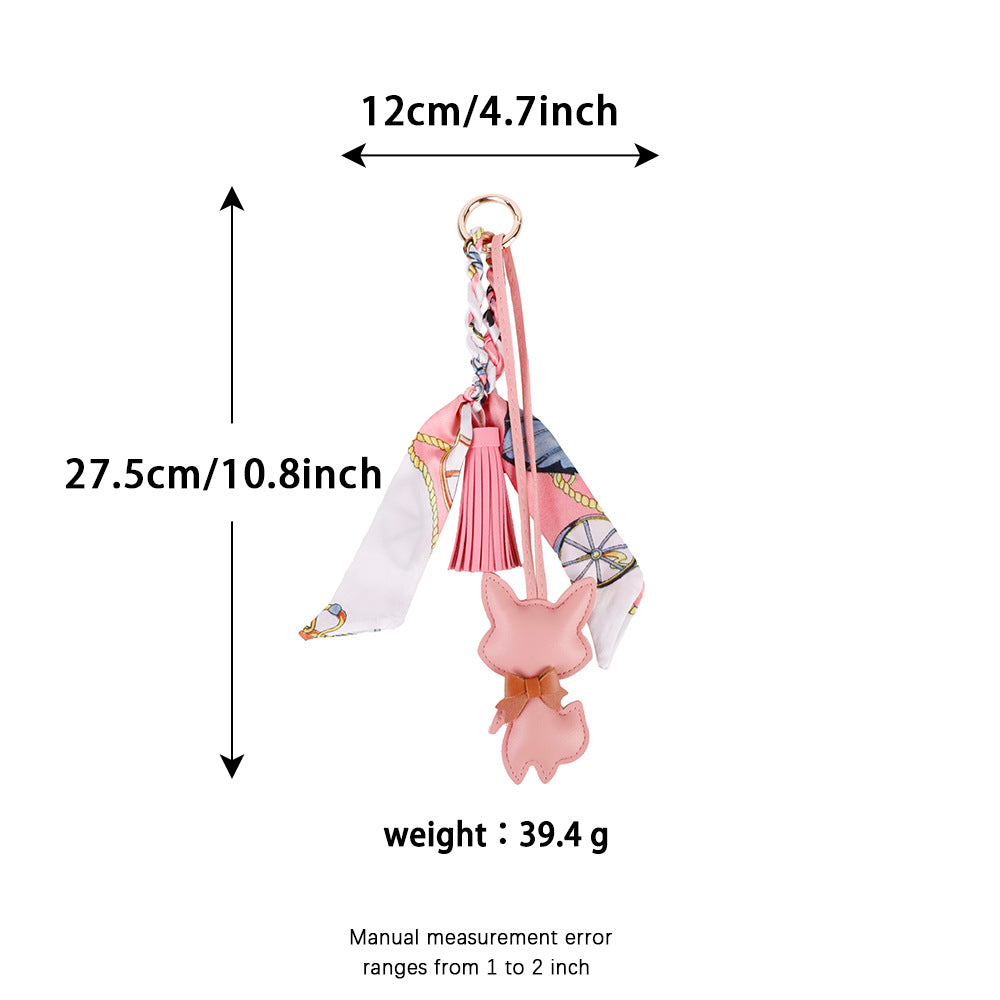 Handmade fox ornament paired with a practical everyday bag