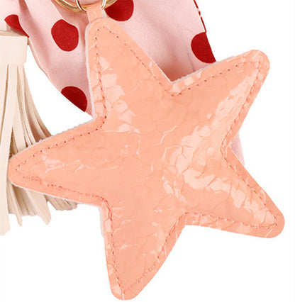 Polka dot bow accessory for decorating a women's handbag