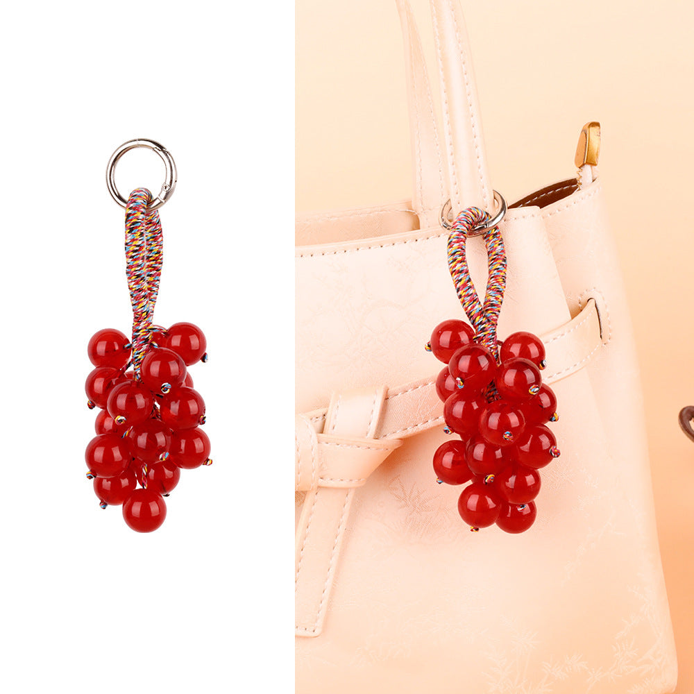 Compact hanging decoration with grape-like shapes