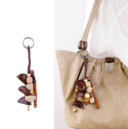 Handmade fruit shell ornament on a canvas tote