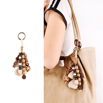 Natural materials combined in a small decorative bag charm