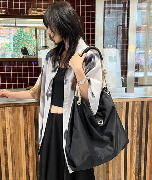 Spacious black tote for grocery runs and quick errands