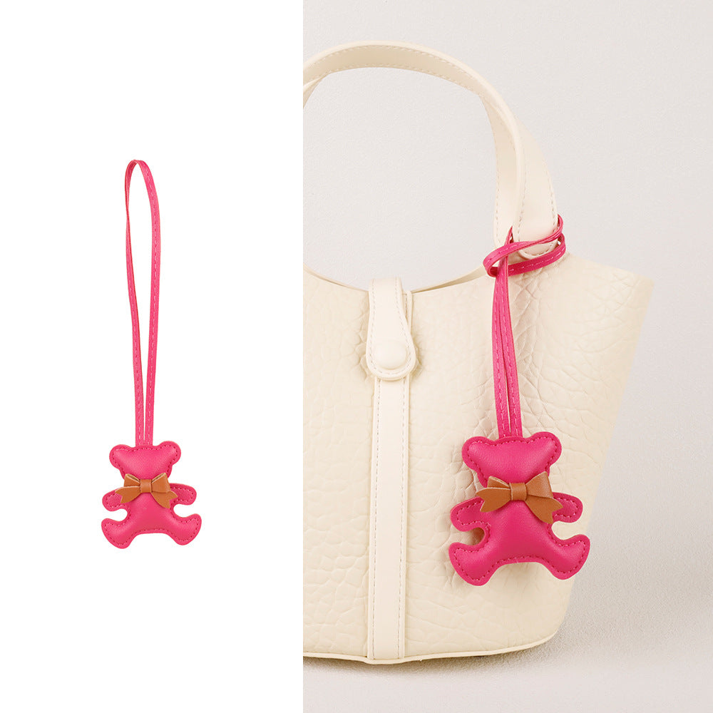 Designer style bear bag pendant giving personality to an everyday shoulder bag