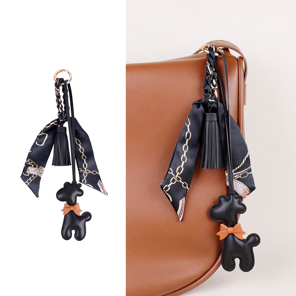 Giraffe decoration paired with a refined leather handbag