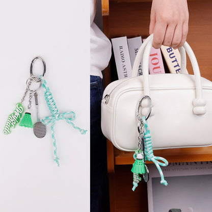 Green bag charm with a casual athletic-inspired style