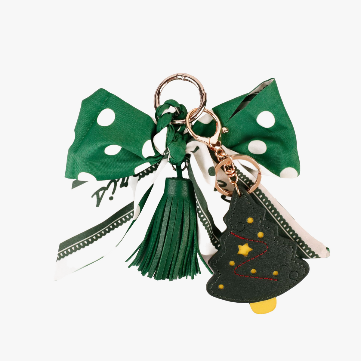 Forest green scarf ribbon bag charm attached to a neutral canvas tote
