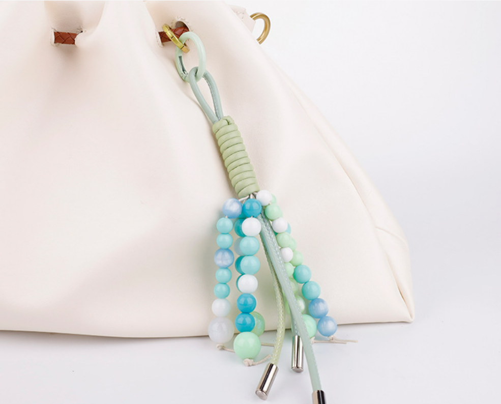 Natural stone tassel charm for an everyday backpack