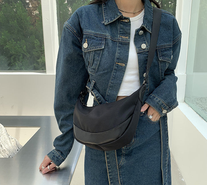 lightweight crossbody purse sized for travel and long sightseeing days