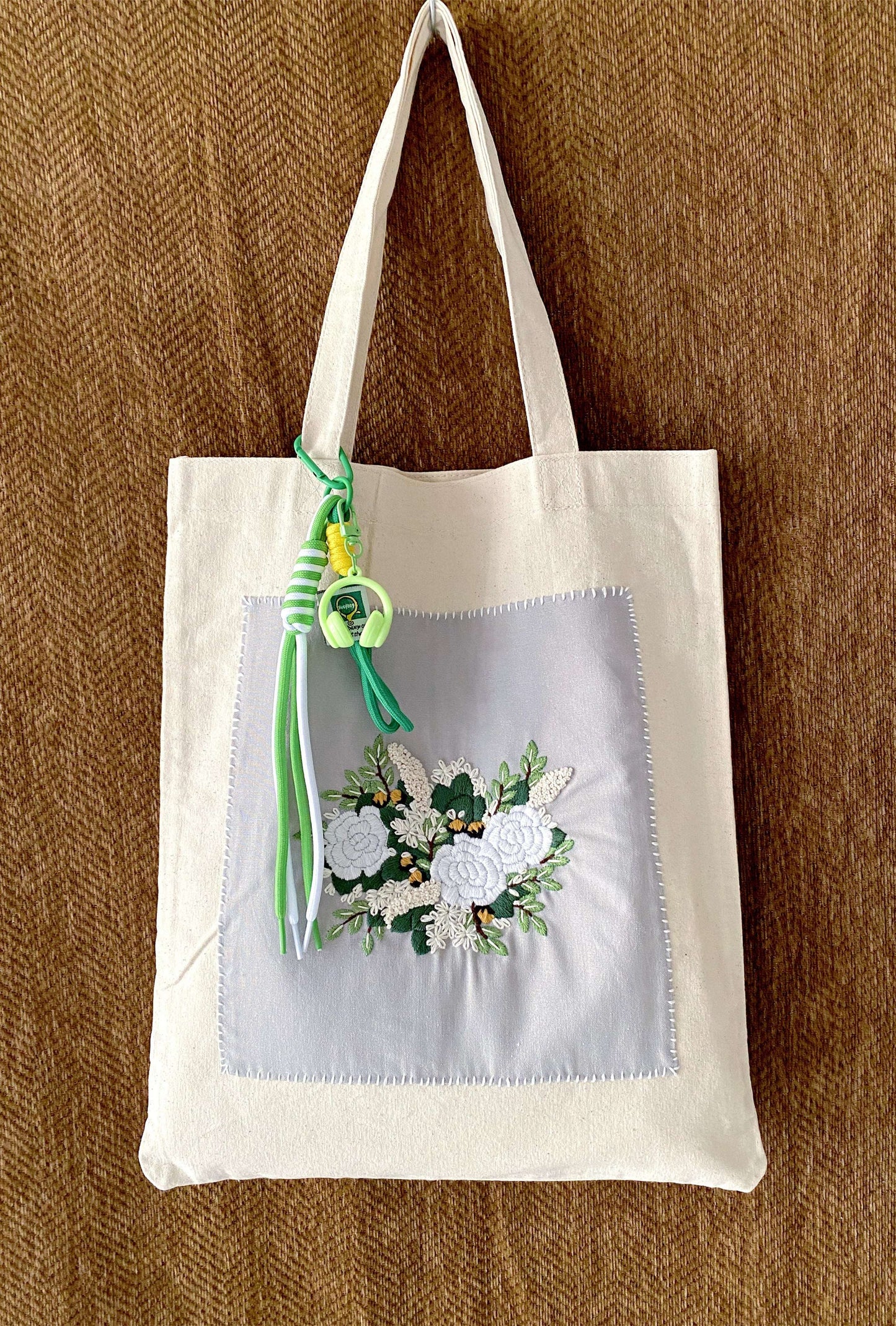 Artistic linen carryall with original hand-embroidery, a creative gift for the free-spirited woman.