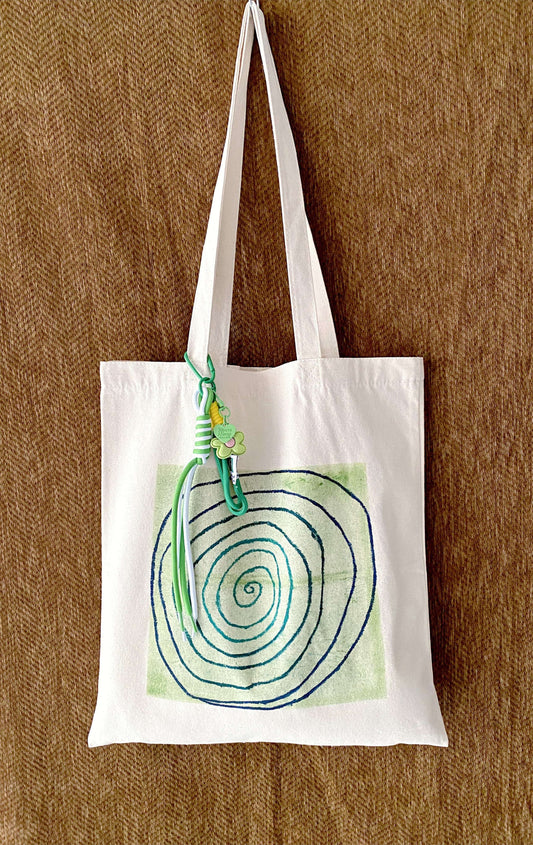 cotton canvas tote bag with visible hand-drawn lines and texture