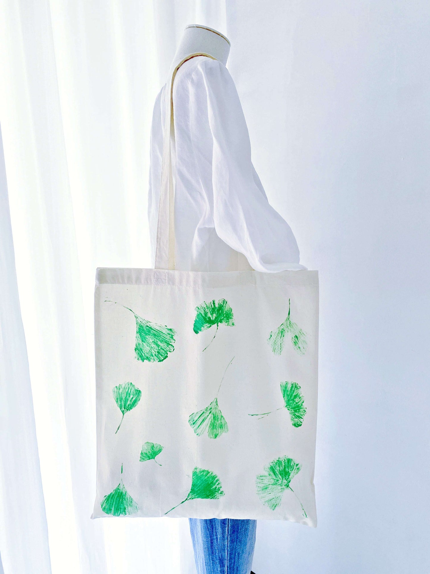 Ditching heavy leather for this ultra-soft fabric carrier. A breathable shoulder bag with botanical art that feels like a hug.