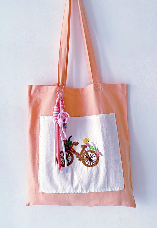 Artistic hand stitched cotton tote for slow living enthusiasts