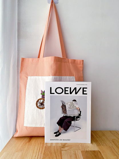Orange tote with original hand-embroidered artwork for someone who appreciates handmade pieces