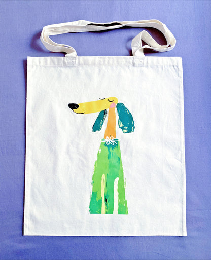 Grab-and-go cotton bag hanging by the door ready for a spontaneous morning walk with the dog
