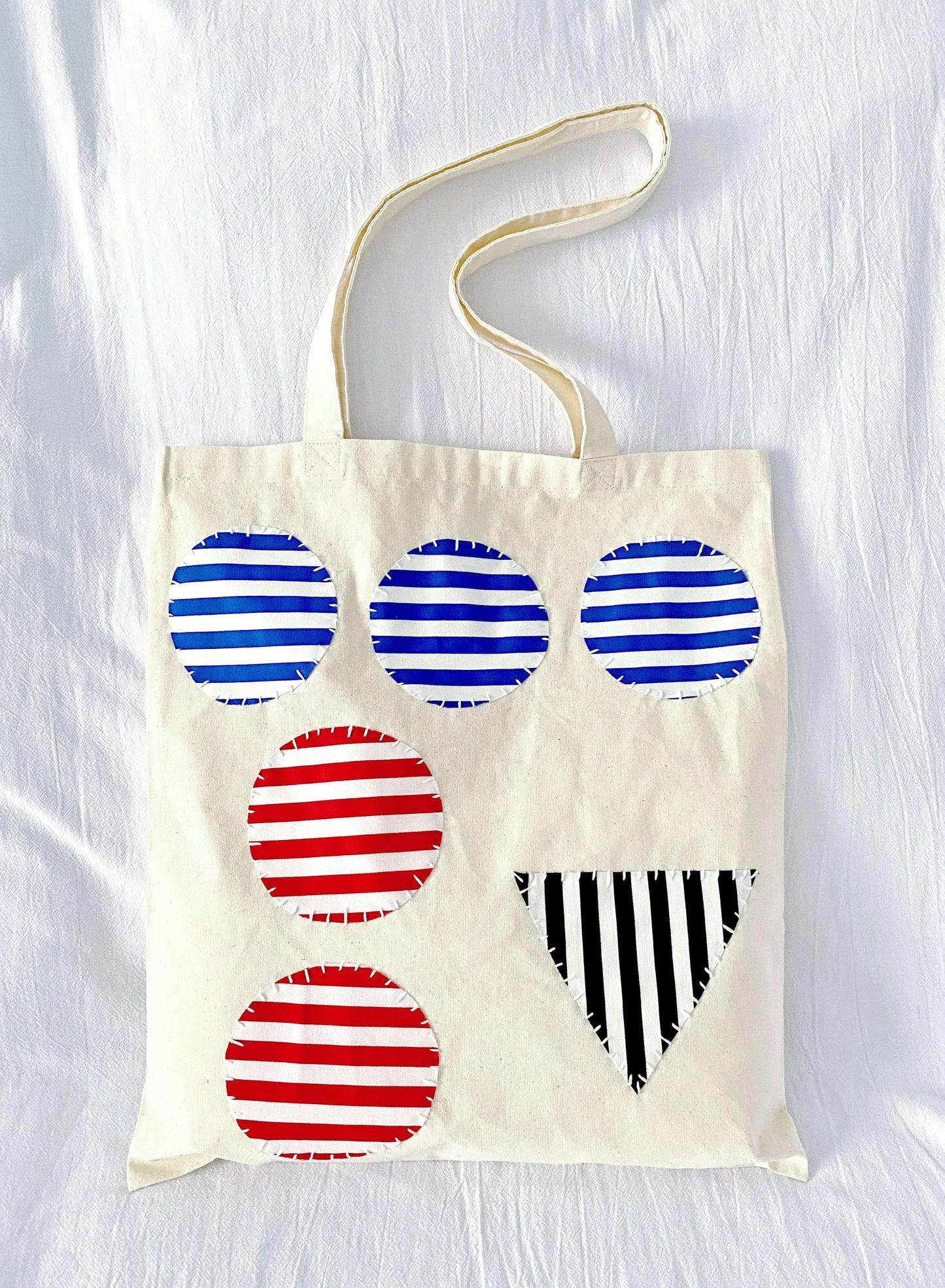 This roomy cotton bag with stitched details is sometimes chosen as a meaningful gift for someone easing into sustainable living.