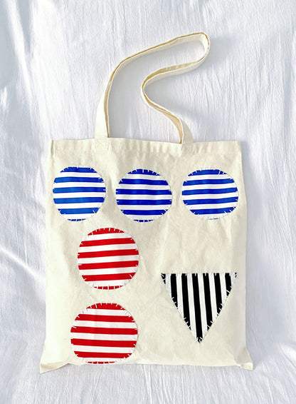 This roomy cotton bag with stitched details is sometimes chosen as a meaningful gift for someone easing into sustainable living.