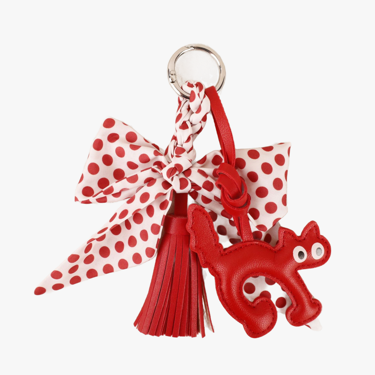 Red polka dot bow bag charm with scarf-style fabric and tassels