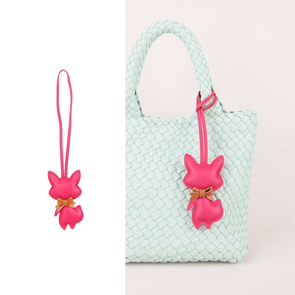 Fox pendant adding a whimsical detail to a shopper tote