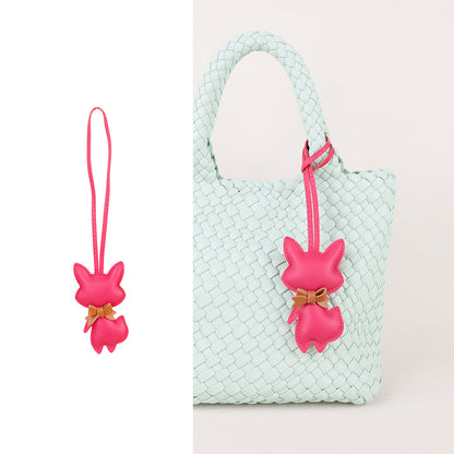 Fox pendant adding a whimsical detail to a shopper tote