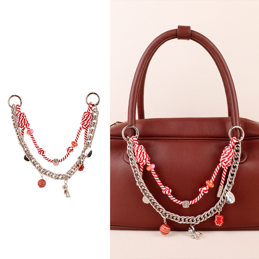 Trendy woven rope charm decorating a neutral canvas travel tote bag