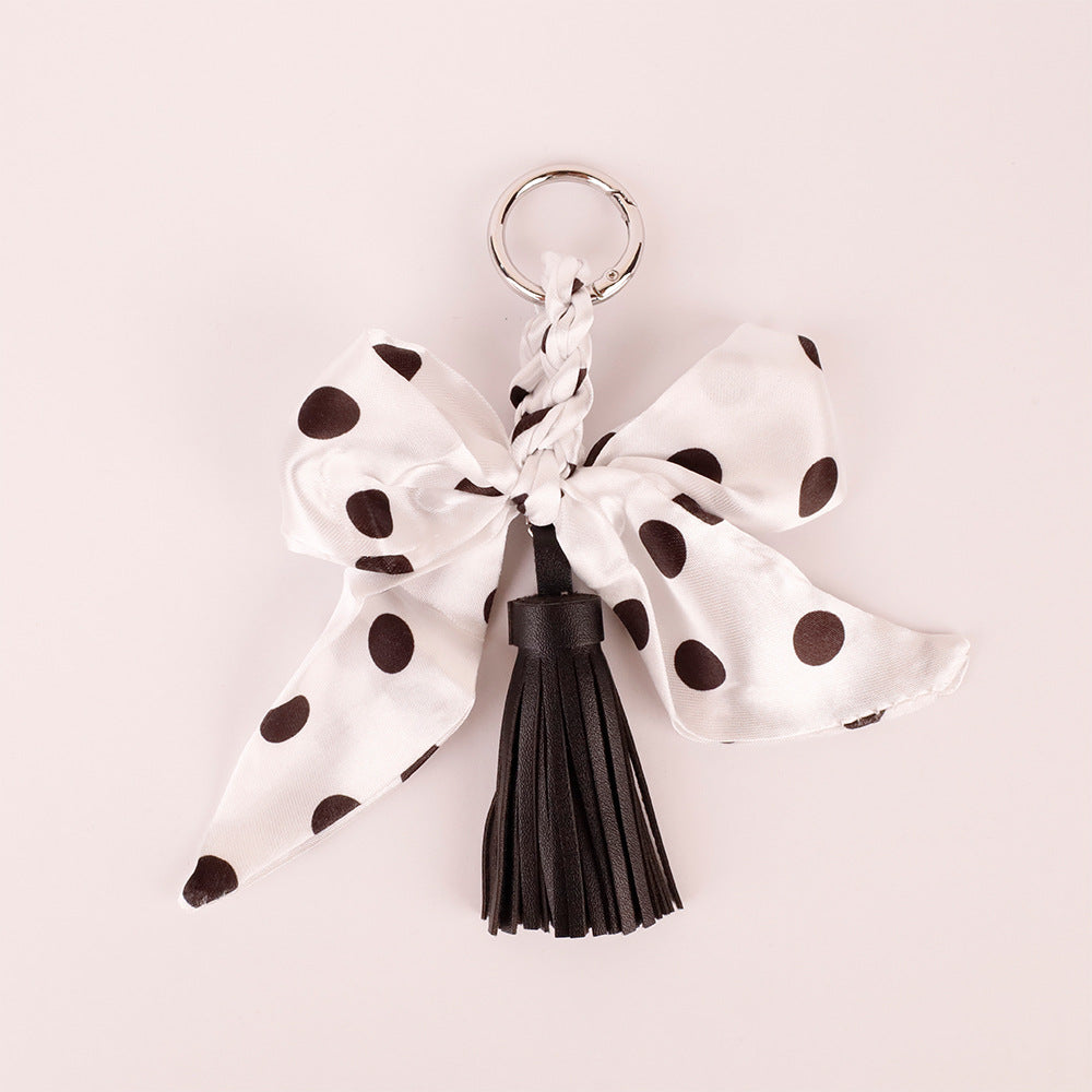 Tassel bow decoration for a canvas tote