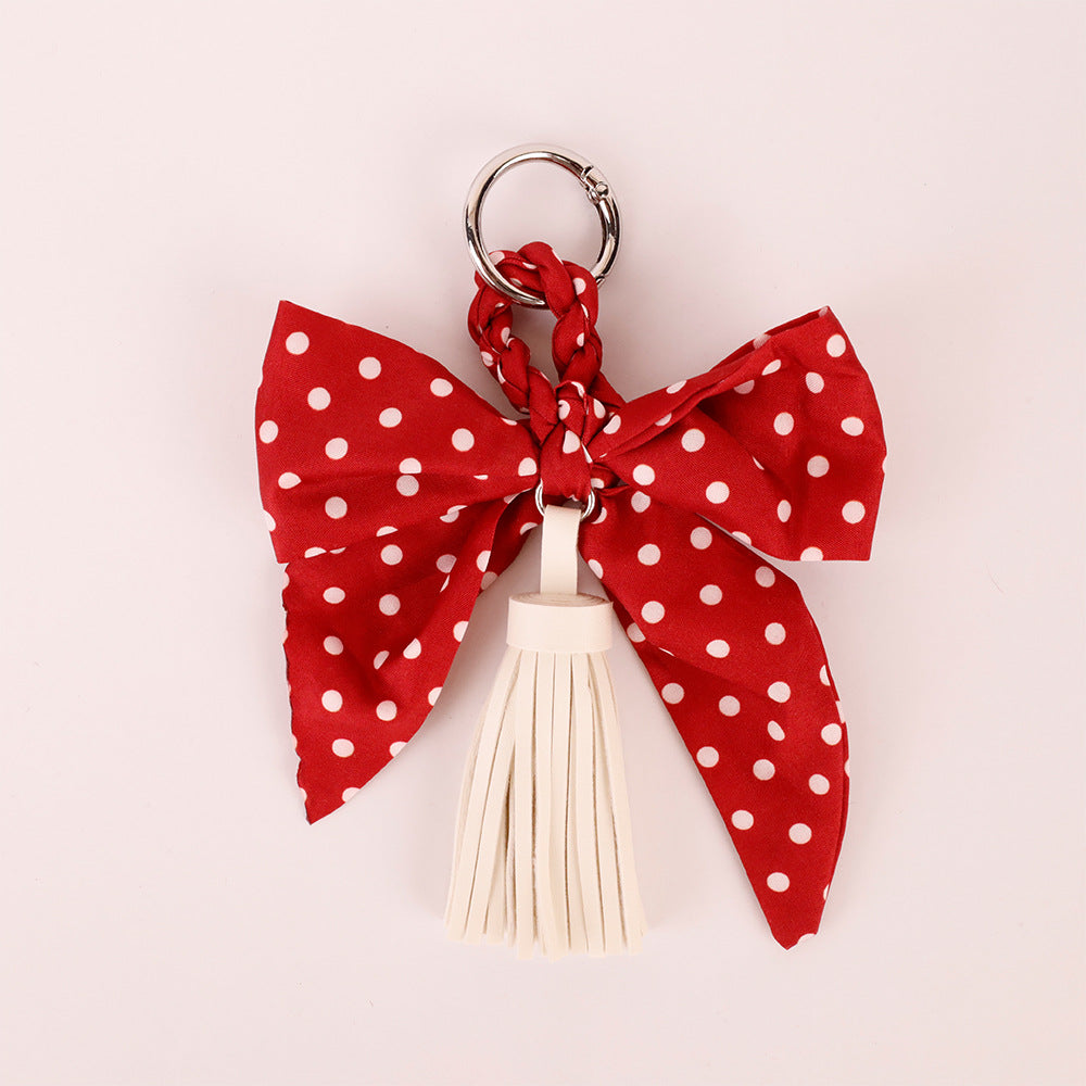 Retro bow pendant with flowing tassel