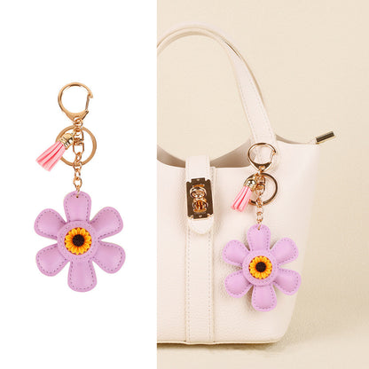 Flower charm with tassel detail for everyday accessories