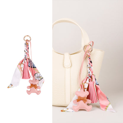 Aesthetic purse decoration featuring a soft teddy bear with custom scarf