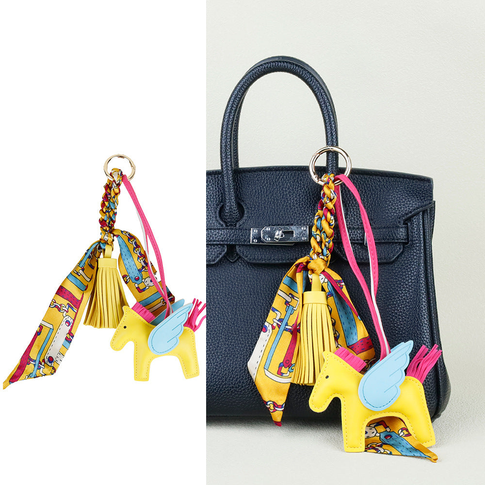 Unique aesthetic purse dangling decoration in warm neutral faux leather tones