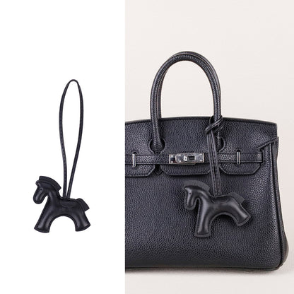 Handmade horse pendant used as a handbag decoration